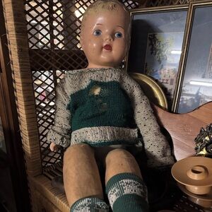 Antique Doll with Green and Gray Sweater